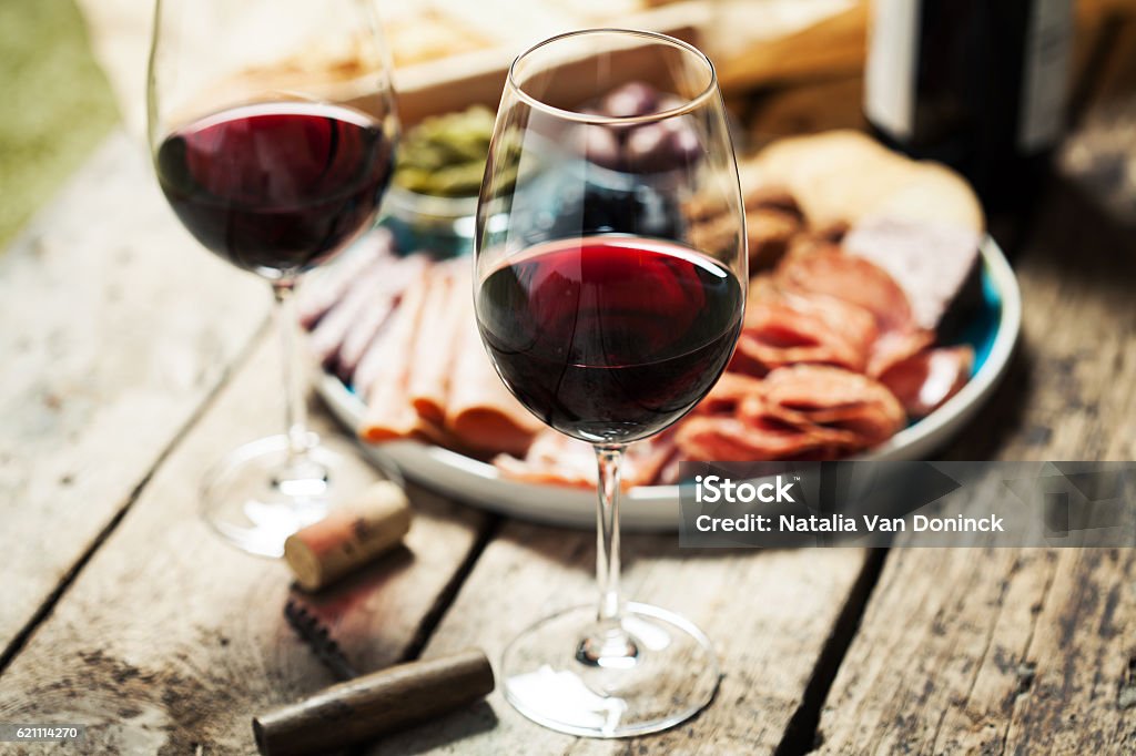 Red wine Red wine with charcuterie assortment on the background Wine Stock Photo