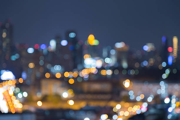 istock Abstract blurred lights night view city downtown 621114390