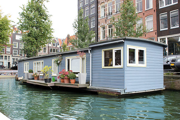 Floating house in Amsterdam stock photo