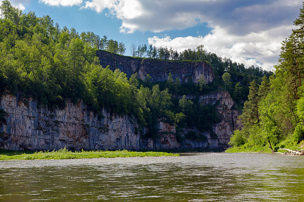istock Low cliffs near the river AI, Ural, Russia 621116268