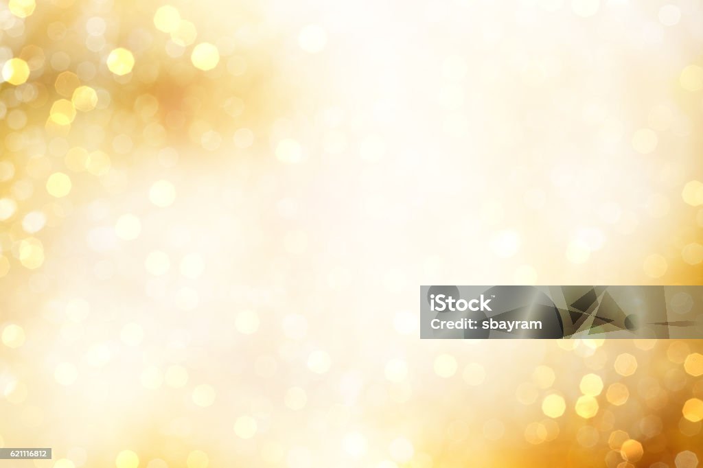 Yellow Defocused Light Background For Christmas Backgrounds Stock Photo