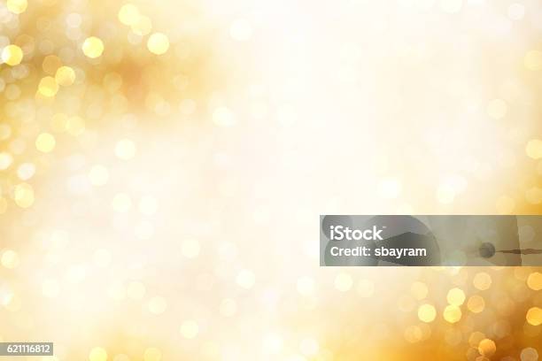 Yellow Defocused Light Background For Christmas Stock Photo - Download Image Now - Backgrounds, Christmas, Gold Colored