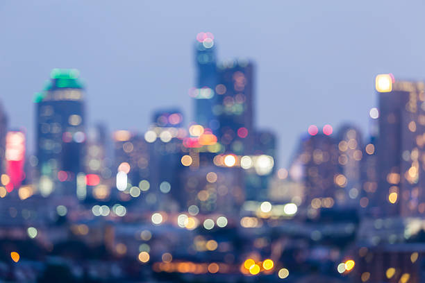 istock Blurred bokeh lights city downtown 621118170