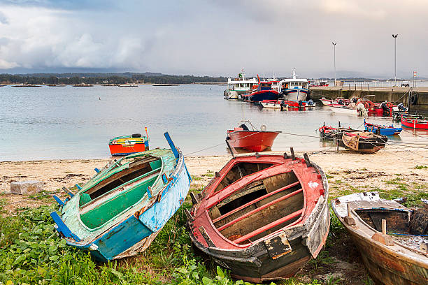 istock Fishing boats in Furado beach 621119538