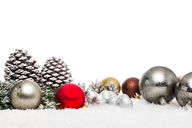 istock Pine cone and Christmas tree ball in decorative snow 621122138