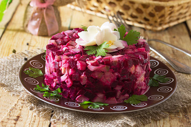 istock Holiday beet salad, decorated with flowers from the egg 621125580