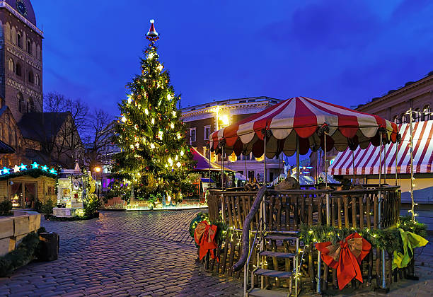 istock Dome square and Christmas tree during the night in Riga 621126380