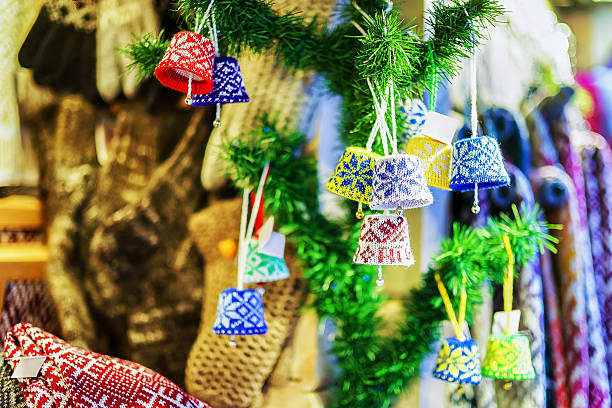istock Small ornamental decorations at the stall during Riga Christmas market 621127236