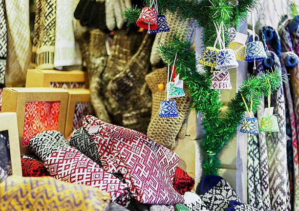 istock Ornamental warm clothes at the stall during Riga Christmas fair 621127700