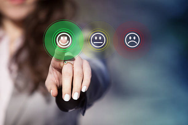 Customer service evaluation. Businesswoman pressing smiley face emoticon on virtual touch screen. Customer service evaluation concept. anthropomorphic smiley face photos stock pictures, royalty-free photos & images