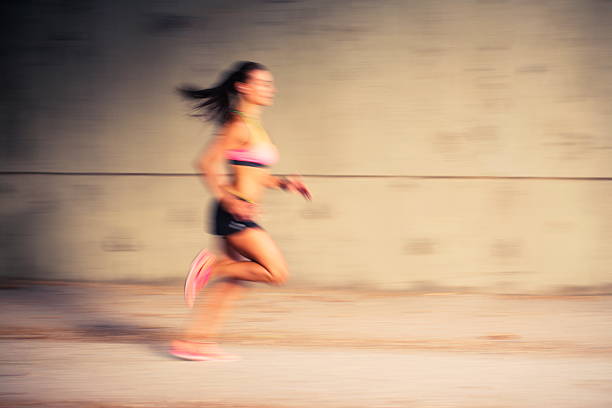 istock Speed concept - Woman running fast 621129794