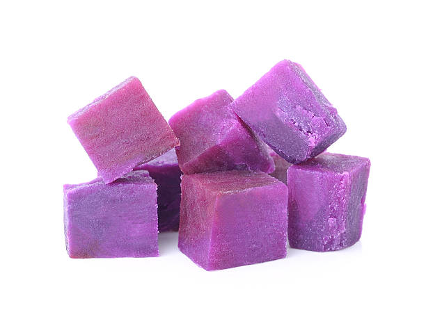 istock cube purple sweet potatoes isolated on white 621130280
