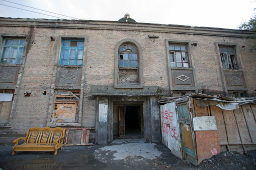 Urumqi, Xinjiang, China - October 4, 2016: Urumqi abandoned residential building outside view. 