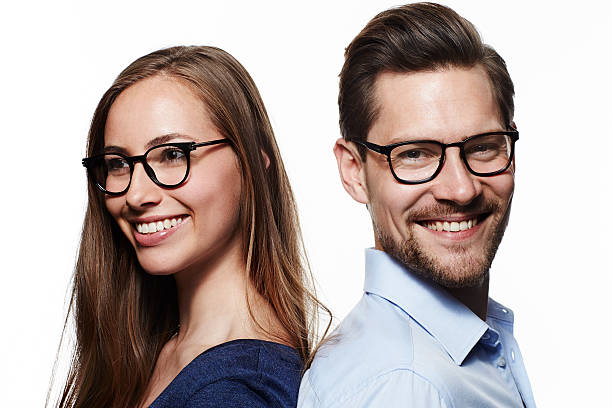 istock Happy couple wearing glasses, smiling 621138034