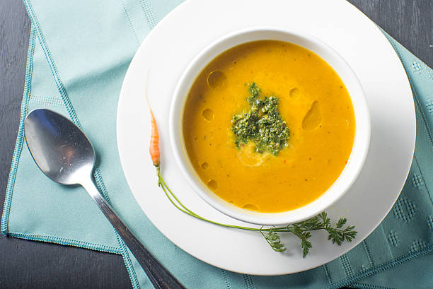 istock Bowl of fresh Pumpkin soup with garnish 621139306