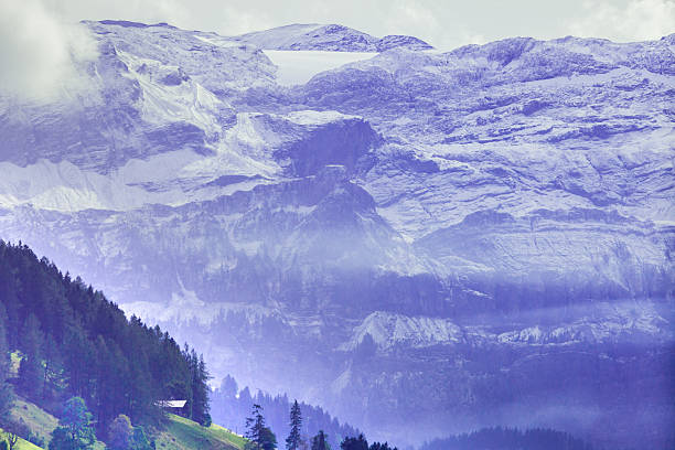 overcast clouds, obersimmental, swiss alps - wildstrubel imagens e fotografias de stock