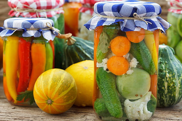 istock Jars of pickled vegetables and autumn squash 621141810