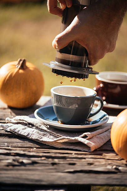 istock Man brewing filter coffee outdoor 621144724