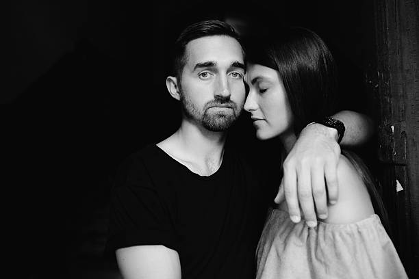 istock couple posing in the doorway 621146042
