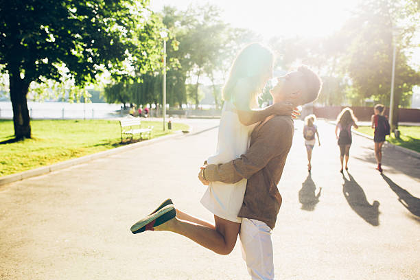 istock man and woman in the park 621146090