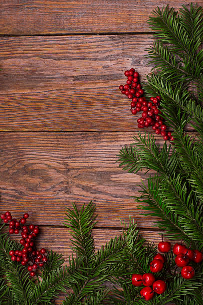 istock Christmas fir tree on wooden background 621146918