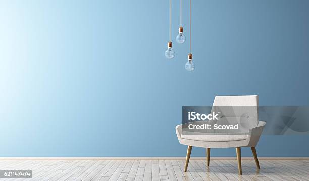 Modern Interior Of Living Room With White Armchair 3d Render Stock Photo - Download Image Now