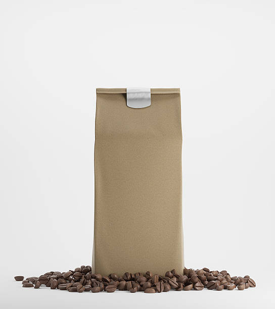 бежевая пачка кофе на белом фоне - coffee bag стоковые фото и изображения