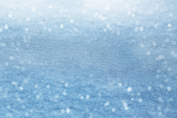 istock Winter background. Sparkling snow with bokeh 621229320