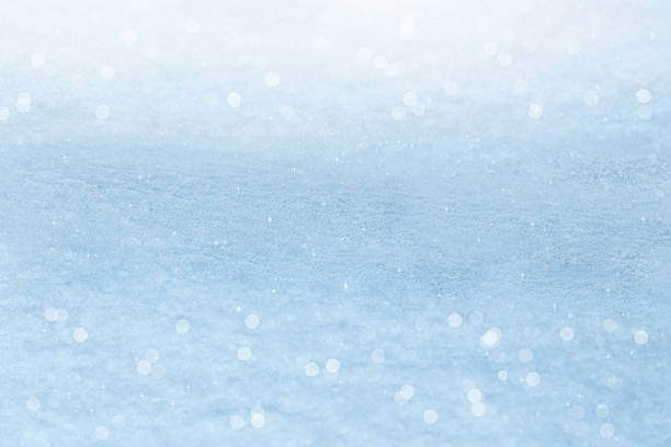 istock Winter background. Sparkling snow with bokeh 621229566