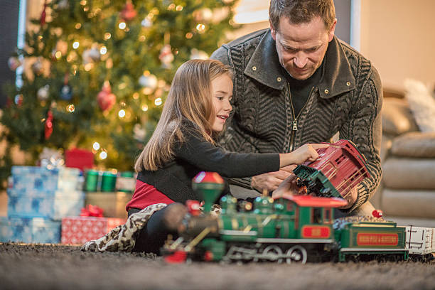 istock Getting a New Toy Train for Christmas 621230676