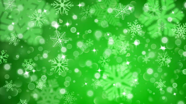 istock Christmas background of fuzzy and focused snowflakes 621231782