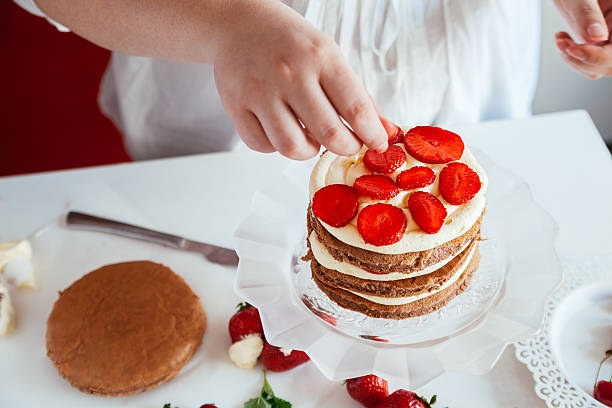 istock Woman Making The Naked Cake 621240278