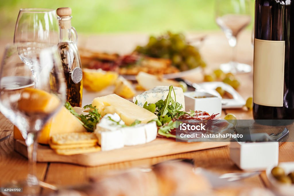 Cheese Board And Red Wine Cheese Board And Red Wine On A Table Cheese Stock Photo