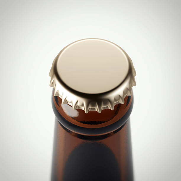 istock Golden cap on a brown beer bottle. 3d rendering 621243126