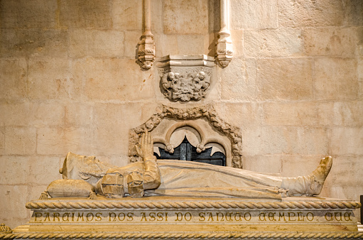 Sarcophagus of Vasco da Gama with lying man on lid inside the Jeronimos Monastery of Belem (Mosteiro dos Jeronimos) 