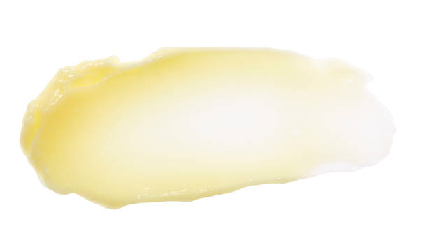 istock Yellow color skincare balm on background 621247234