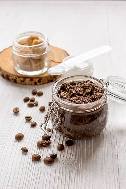 istock jar coffee-chocolate scrub on wooden table 621247594