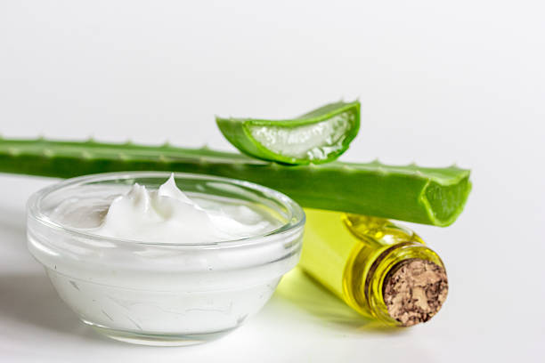 istock extract from aloe vera in glass bottle and cream macro 621247810