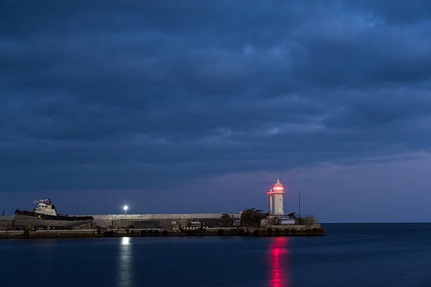 istock Night view of the Yalta lighthouse 621249410