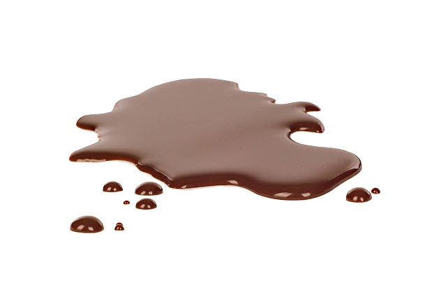 spilled chocolate on white background - puddle imagens e fotografias de stock