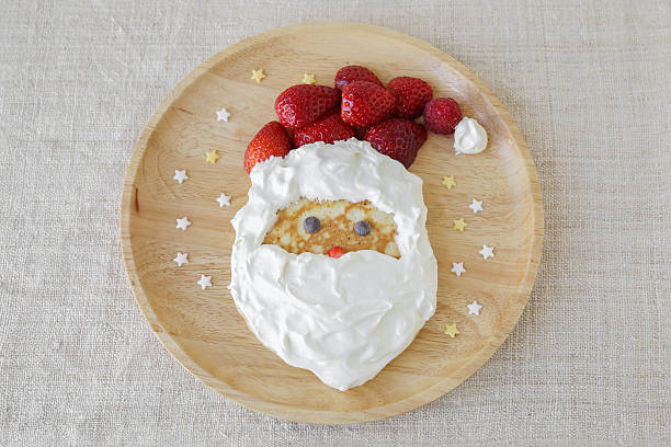 istock Fun homemade santa pancake breakfast for kids 621250136