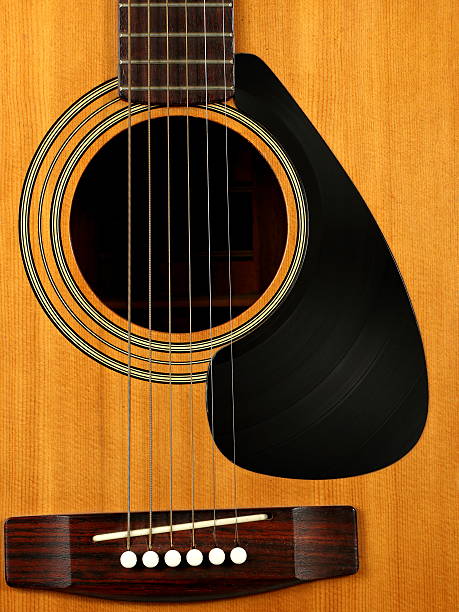 istock Acoustic Guitar with Vinyl Record for a Pick Guard 621250272