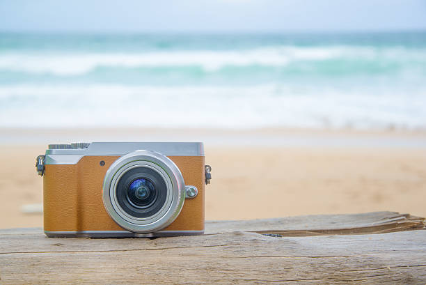 istock Rero camera on wood at sea 621253756