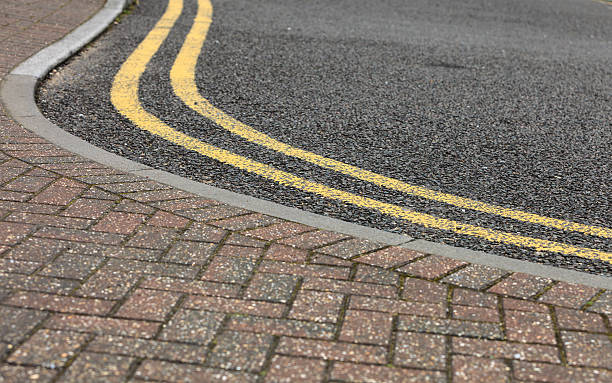 istock footpath pavement sidewalk with traffic sign 621254676