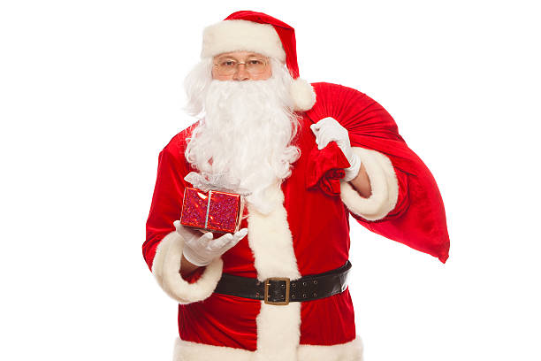 istock Santa Claus: Cheerful With Small Stack Of Gifts big bag 621254802