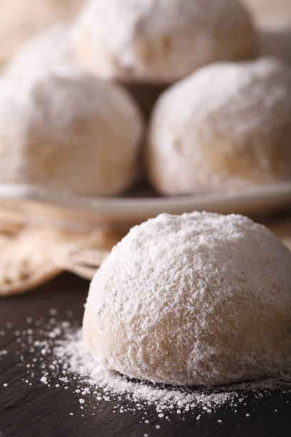 istock Mexican wedding cookies on the table close-up. vertical 621256120