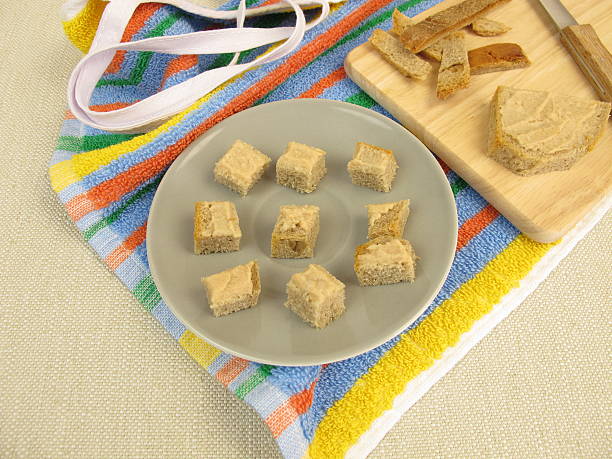 bread cubes with pate as finger food for toddlers - brotaufstrich imagens e fotografias de stock