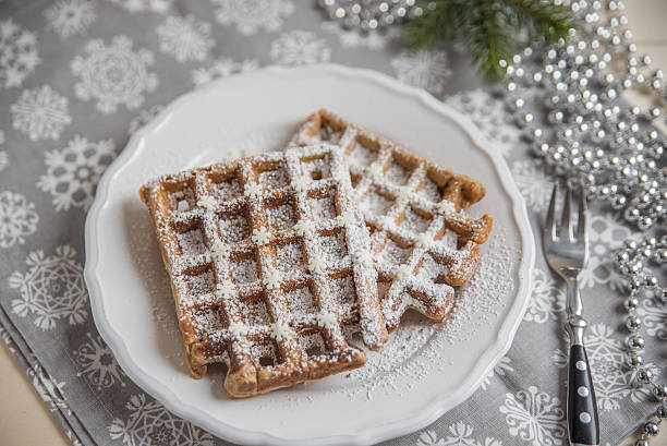 istock Christmas Waffles with sugar and sprinkles 621257438