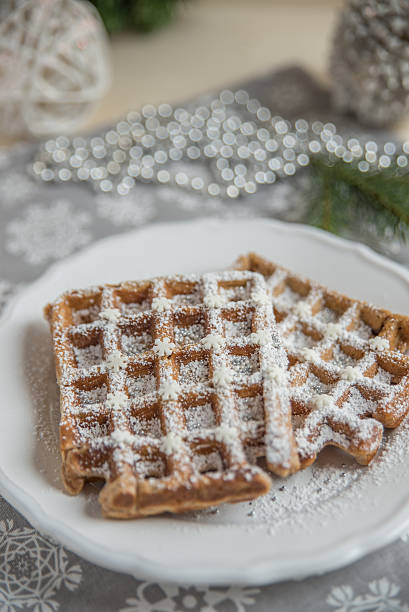 istock Christmas Waffles with sugar and sprinkles 621257616