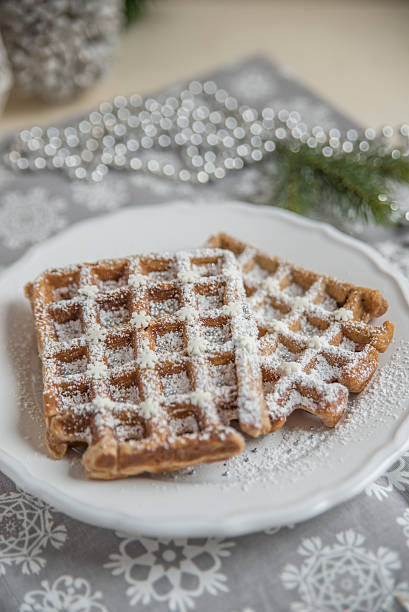 istock Christmas Waffles with sugar and sprinkles 621257698